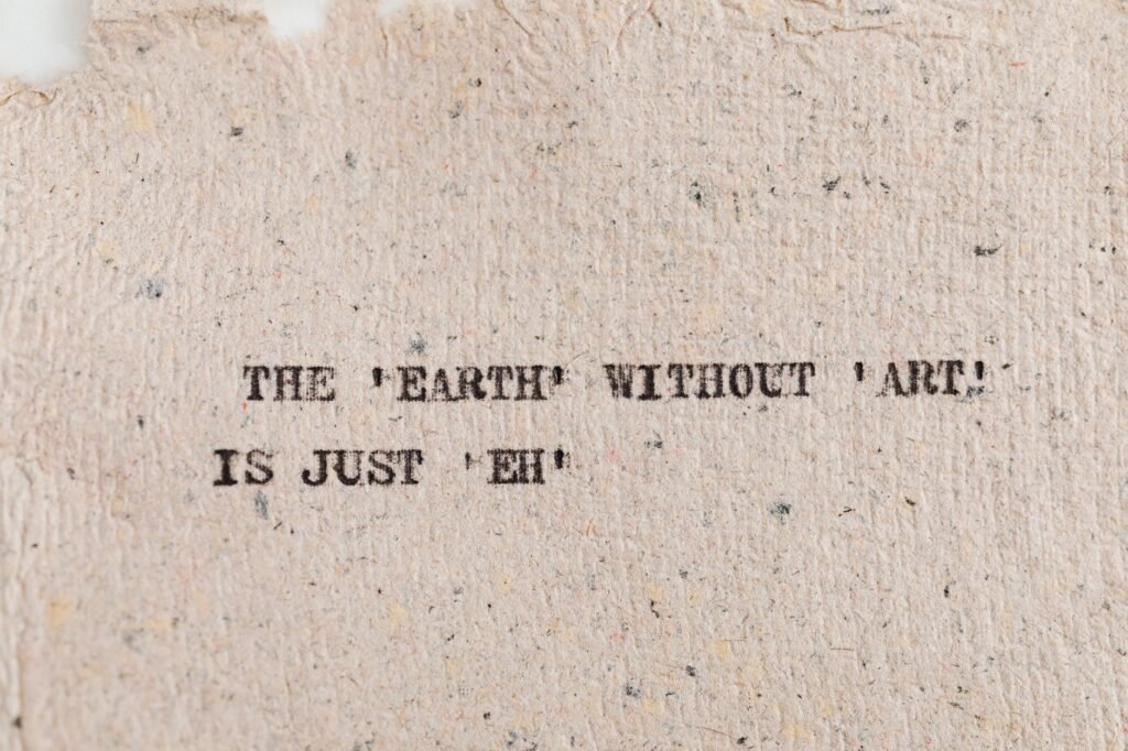 Textured paper with motivational quote highlighting art's importance.