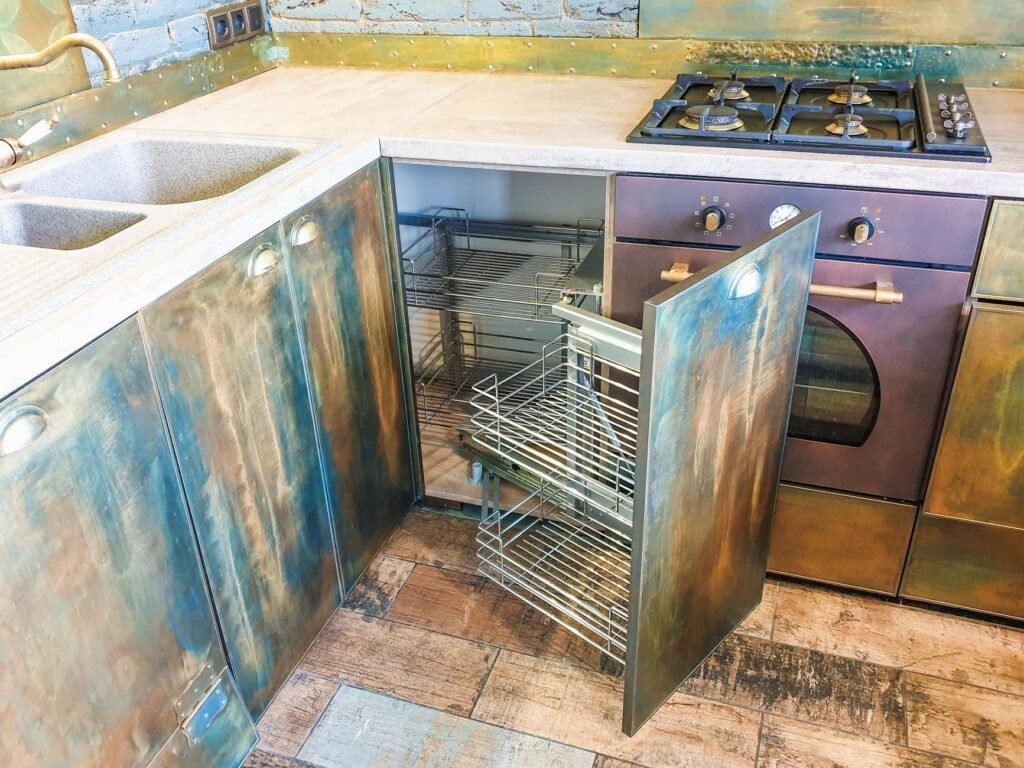 A modern kitchen featuring rustic metal cabinets and a gas stove, highlighting innovative interior design.