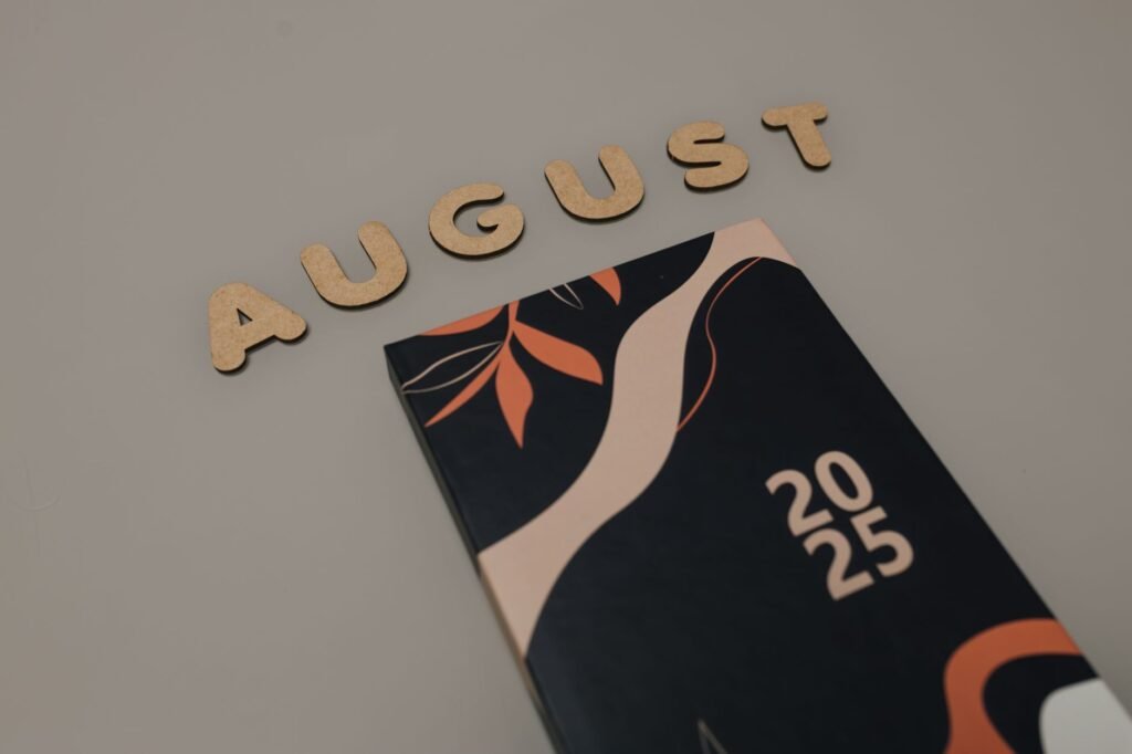 Flat lay of an August calendar with artistic design for 2025.